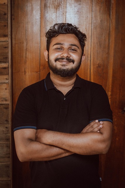 marketing professional analyzing campaign performance data on multiple screens in office